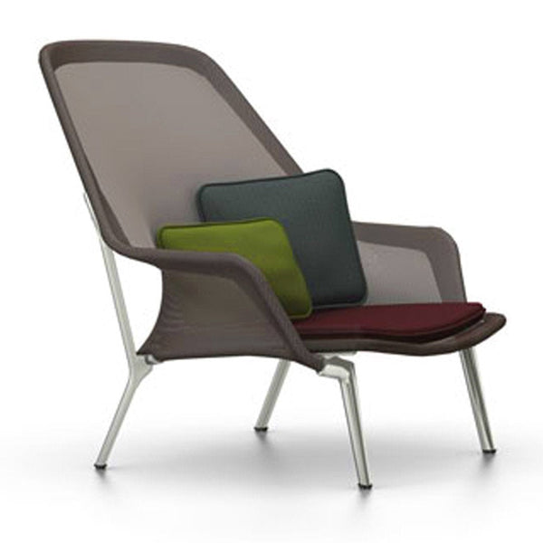 Modern chair featuring a mix of neutral grays, deep green, and burgundy cushions, with a sleek silver frame.