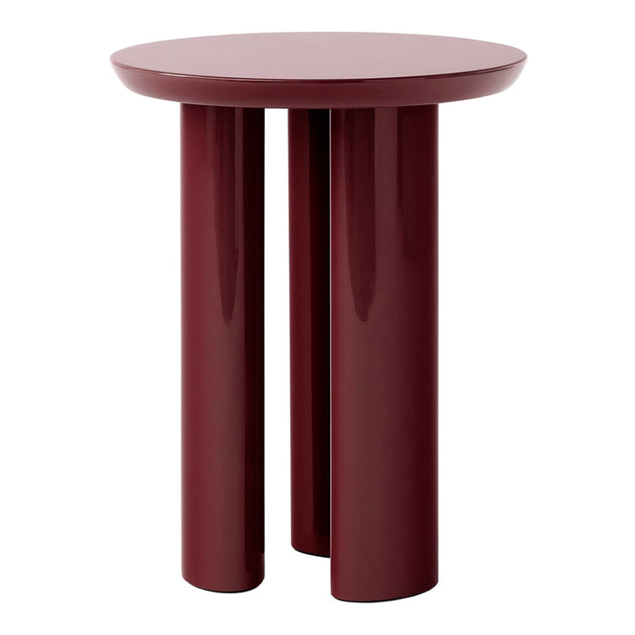 Burgundy round side table with glossy finish and three cylindrical legs, perfect for modern decor.