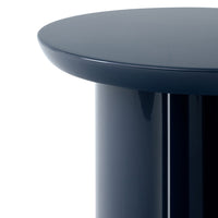 Sleek round navy blue table with a glossy finish and smooth, minimalist design.
