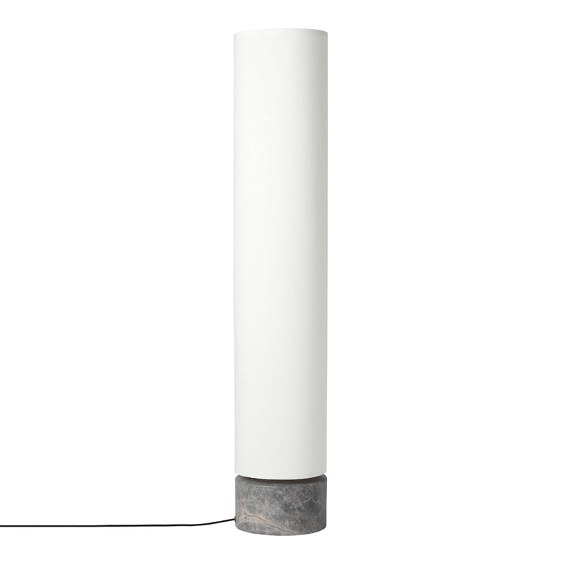 White cylindrical lamp with a textured concrete base, minimalist design for modern decor.