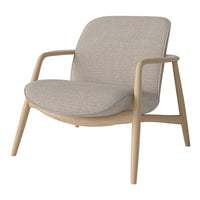 Beige fabric armchair with a smooth, subtle texture and light wooden legs, perfect for modern decor.