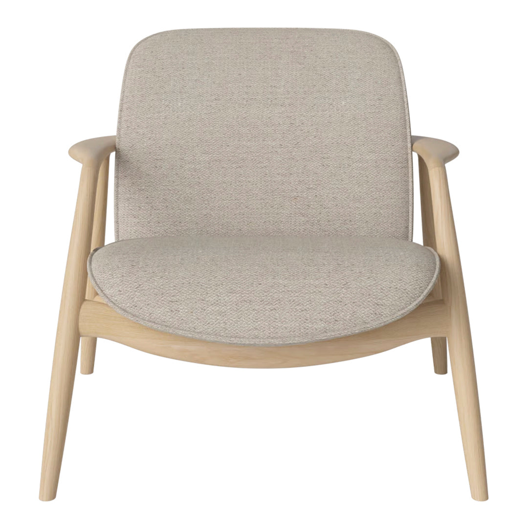 Soft beige upholstery with a subtle texture, complemented by light wood frame for a modern, minimalist look.
