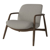 Light gray upholstered chair with a smooth texture and walnut wood frame, showcasing a modern, minimalist design.
