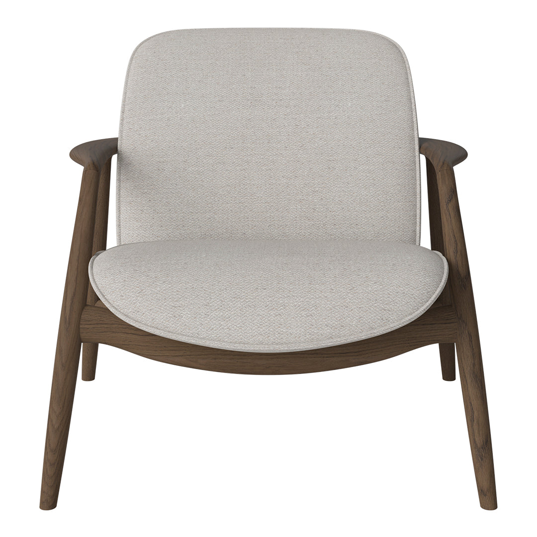 Light gray upholstered chair with a smooth texture and wooden legs in a warm brown finish. Minimalist design.
