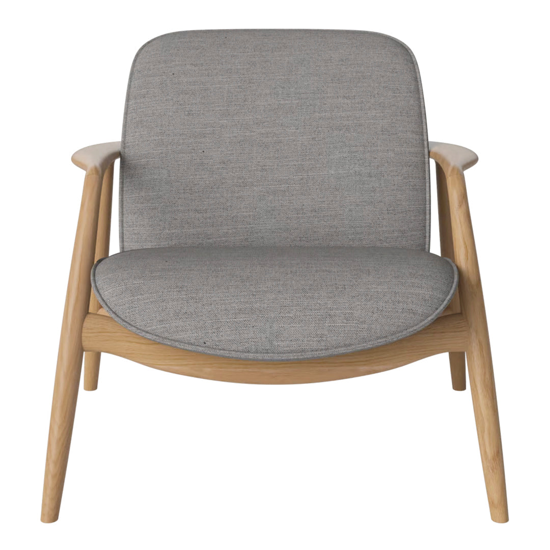Light grey upholstered chair with a smooth texture and natural wood legs in a minimalist design.