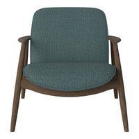 Teal upholstered chair with textured fabric and warm wood legs, perfect for modern living spaces.