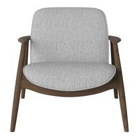 Light gray upholstered chair with a textured pattern and dark wood legs. Modern design for stylish interiors.