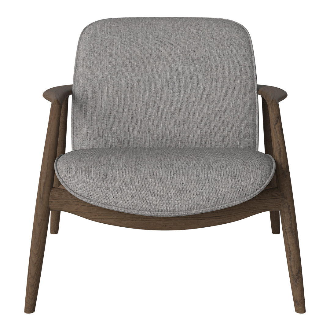 Gray upholstered armchair with a smooth texture and wooden legs, featuring a minimalist design.