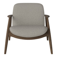 Gray fabric armchair with a smooth, minimalist design and natural wood legs. Perfect for modern interiors.