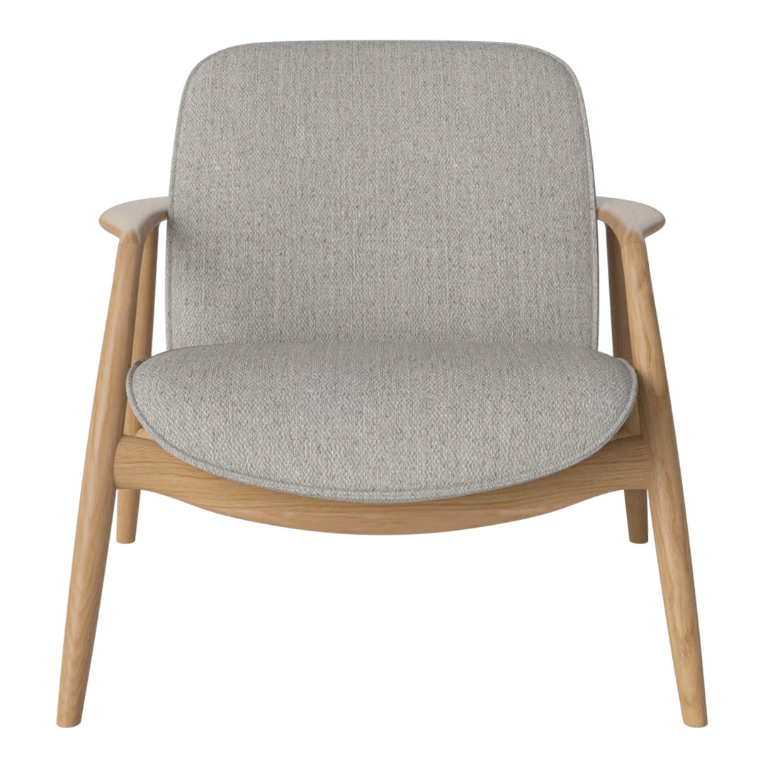 Stylish light gray upholstered chair with natural wood legs, featuring a minimalist design and subtle texture.