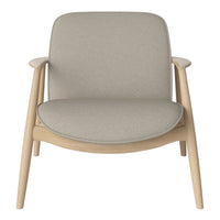 Light gray upholstered chair with a smooth, minimalist design and natural wood frame. Perfect for modern decor.