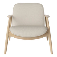 Light beige upholstered chair with minimalist design and natural wood legs, perfect for modern home decor.