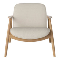 Light beige upholstered chair with a minimalist design and natural wood legs. Soft, neutral tones for versatile styling.