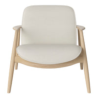 Cream-colored armchair with a smooth, minimalist design and natural wood accents. Perfect for modern decor.