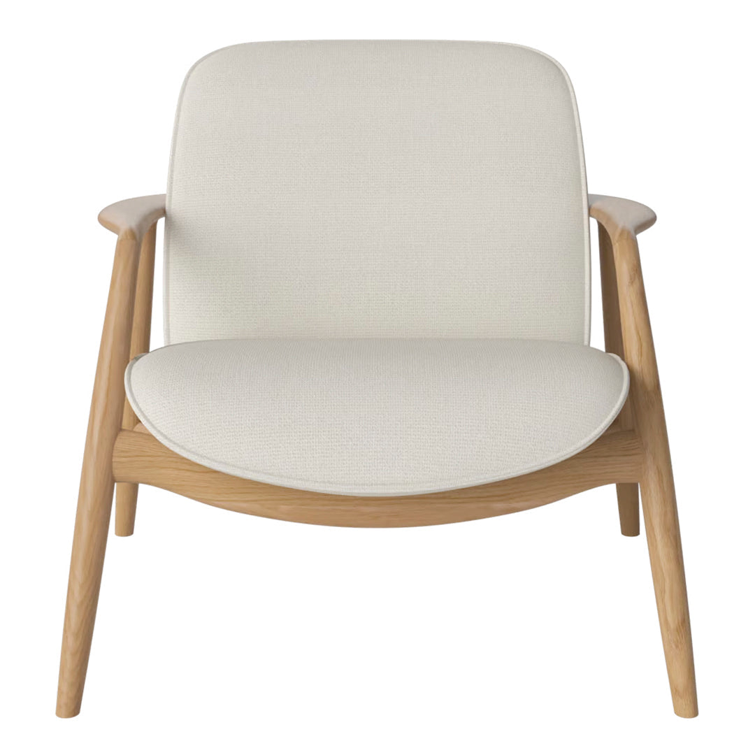 Cream-colored upholstered chair with a smooth, rounded seat and natural wood frame. Elegant, minimalist design.