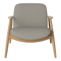 Light gray upholstered chair with wooden legs, featuring a smooth, minimalistic design. Ideal for modern interiors.