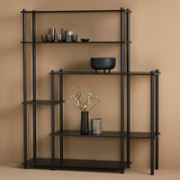 Black metal shelving unit on a beige background, featuring geometric patterns and sleek lines. Perfect for modern decor.