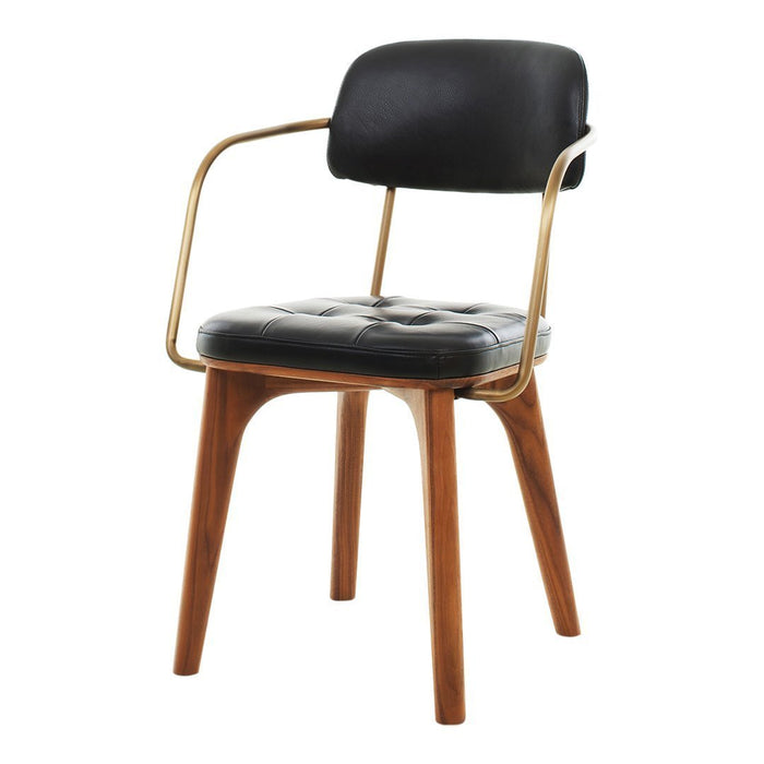 Black upholstered chair with a tufted seat, gold metal arms, and wooden legs for a modern, stylish look.