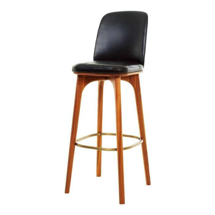 Black leather bar stool with a warm wood base and gold accents, showcasing modern design and elegant simplicity.