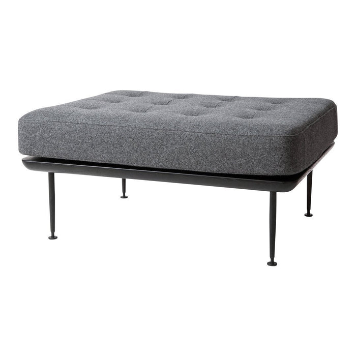 Gray tufted ottoman with a sleek black metal frame, perfect for modern decor.