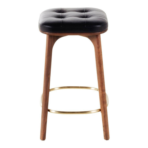 Black tufted cushion bar stool with natural wood legs and gold footrest accents.