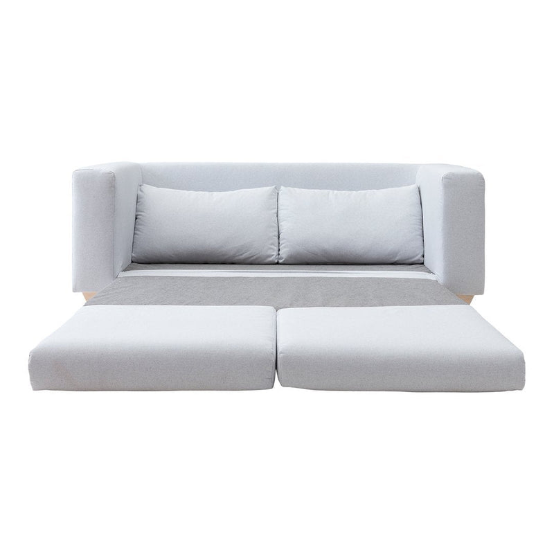 Gray modular sofa with smooth fabric and minimalist design, featuring three plush cushions and convertible seating.