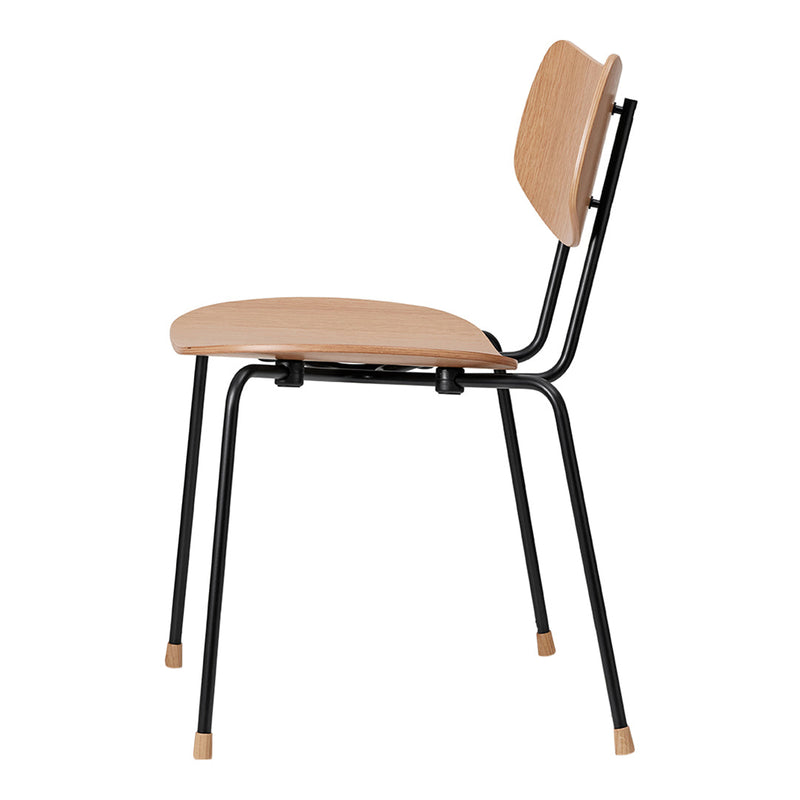 Minimalist wooden chair in natural wood tone with sleek black metal frame and subtle golden foot caps.