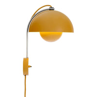 Sleek yellow dome wall lamp with a chrome arm, featuring a round white bulb and matching yellow cord.