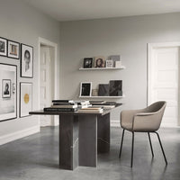Modern gray and beige office with marble table and muted wall art, featuring clean lines and minimalistic patterns.