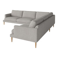 Modern gray sectional sofa with clean lines and wooden legs, featuring a minimalist design and soft upholstery.