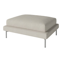 Light beige upholstered ottoman with a smooth, minimalistic design and sleek metal legs. Perfect for modern decor.