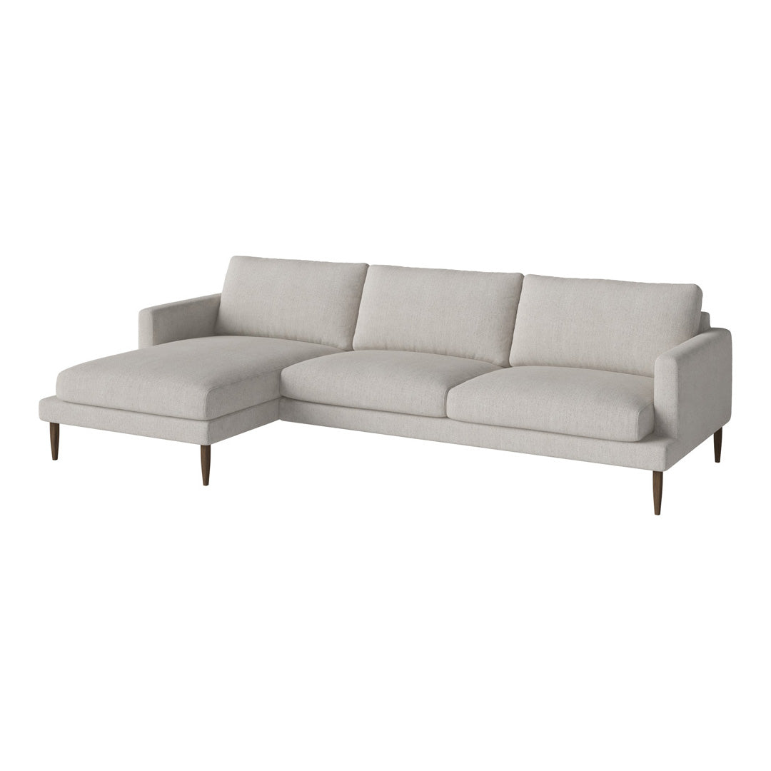 Light gray sectional sofa with clean lines and minimalistic design, featuring soft, textured fabric upholstery.