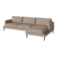 Beige sectional sofa with clean lines and textured fabric, featuring a modern design and tapered wood legs.