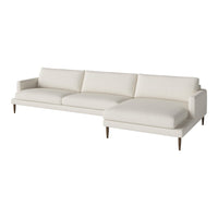 Modern white sectional sofa with clean lines and minimalistic design, featuring soft upholstery and natural wood legs.