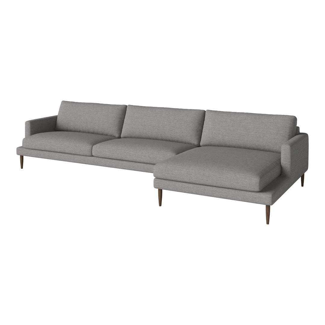 Gray fabric sectional sofa with a modern minimalist design and wooden legs, featuring a smooth, solid texture.