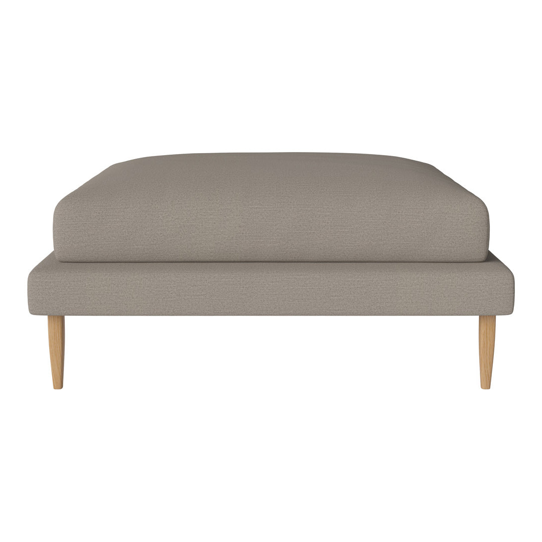 Gray upholstered sofa with a smooth, solid pattern and light wooden legs. Ideal for modern living spaces.