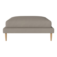 Gray upholstered sofa with a smooth, solid pattern and light wooden legs. Ideal for modern living spaces.
