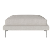 Light gray upholstered ottoman with a smooth texture and minimalistic design, featuring sleek silver legs.