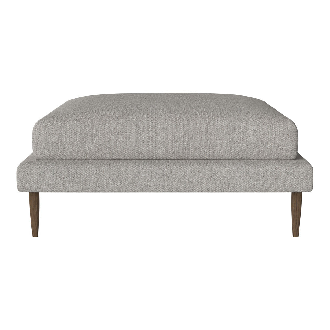 Light gray upholstery ottoman with a simple, textured fabric and wooden legs, perfect for modern decor.
