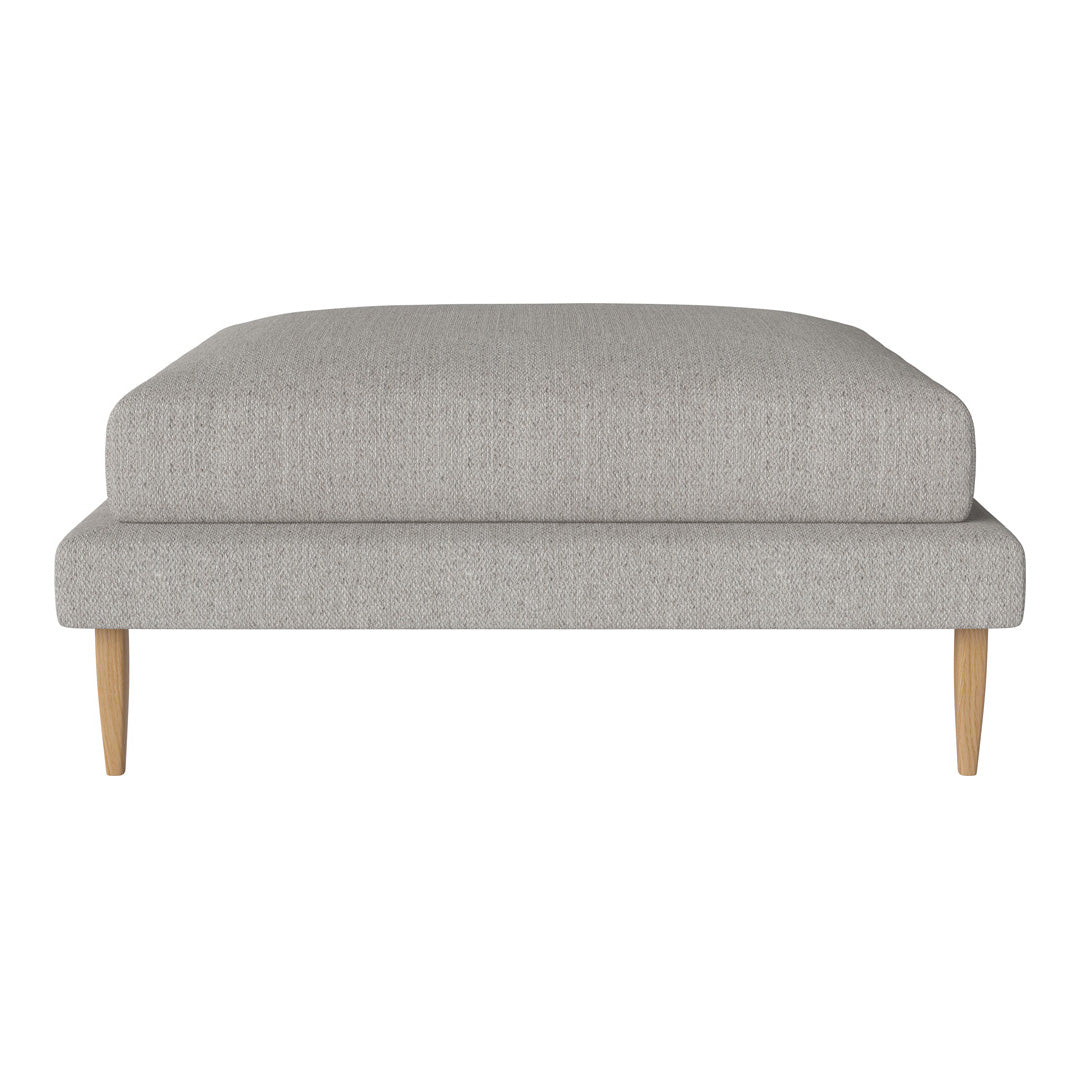 Light gray upholstered pouf with a textured pattern and natural wood legs, perfect for modern decor.