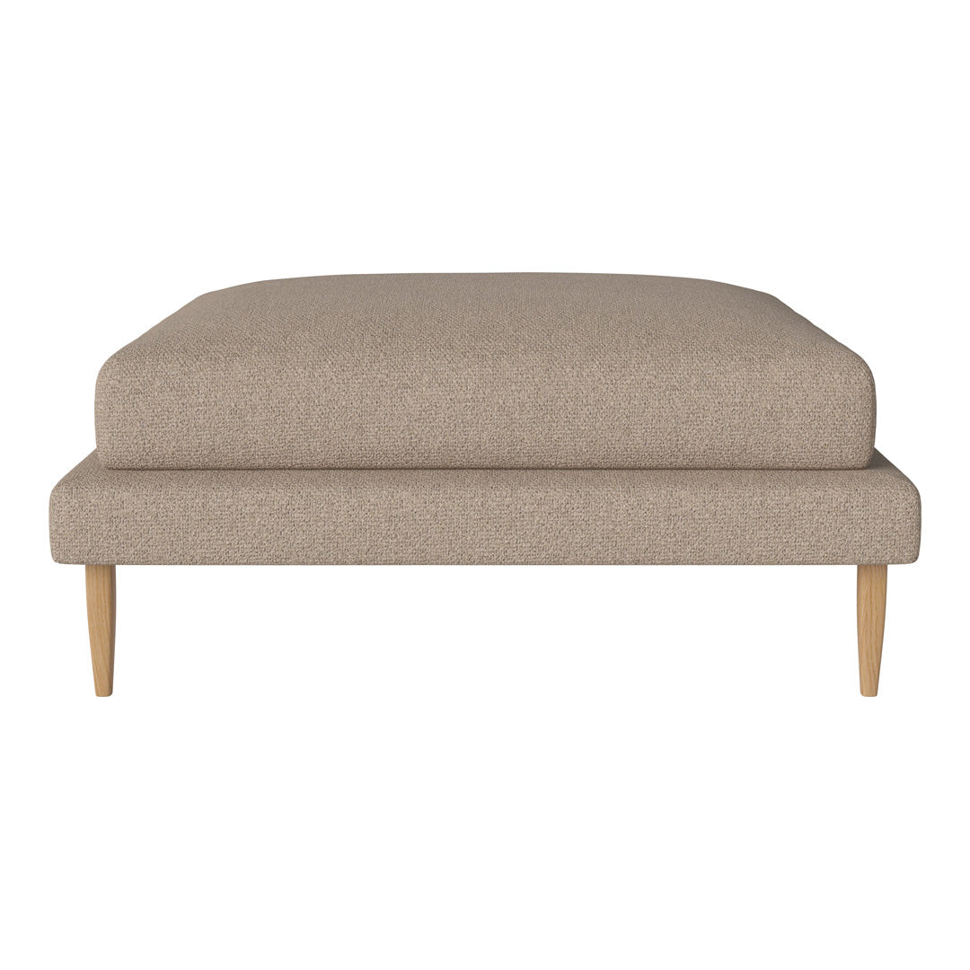 Beige upholstered ottoman with a smooth fabric texture and natural wooden legs. Ideal for modern living spaces.