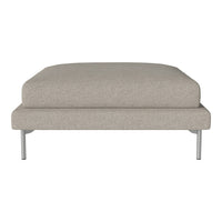 Beige upholstered ottoman with a smooth, minimalist design and silver metal legs. Ideal for modern decor.