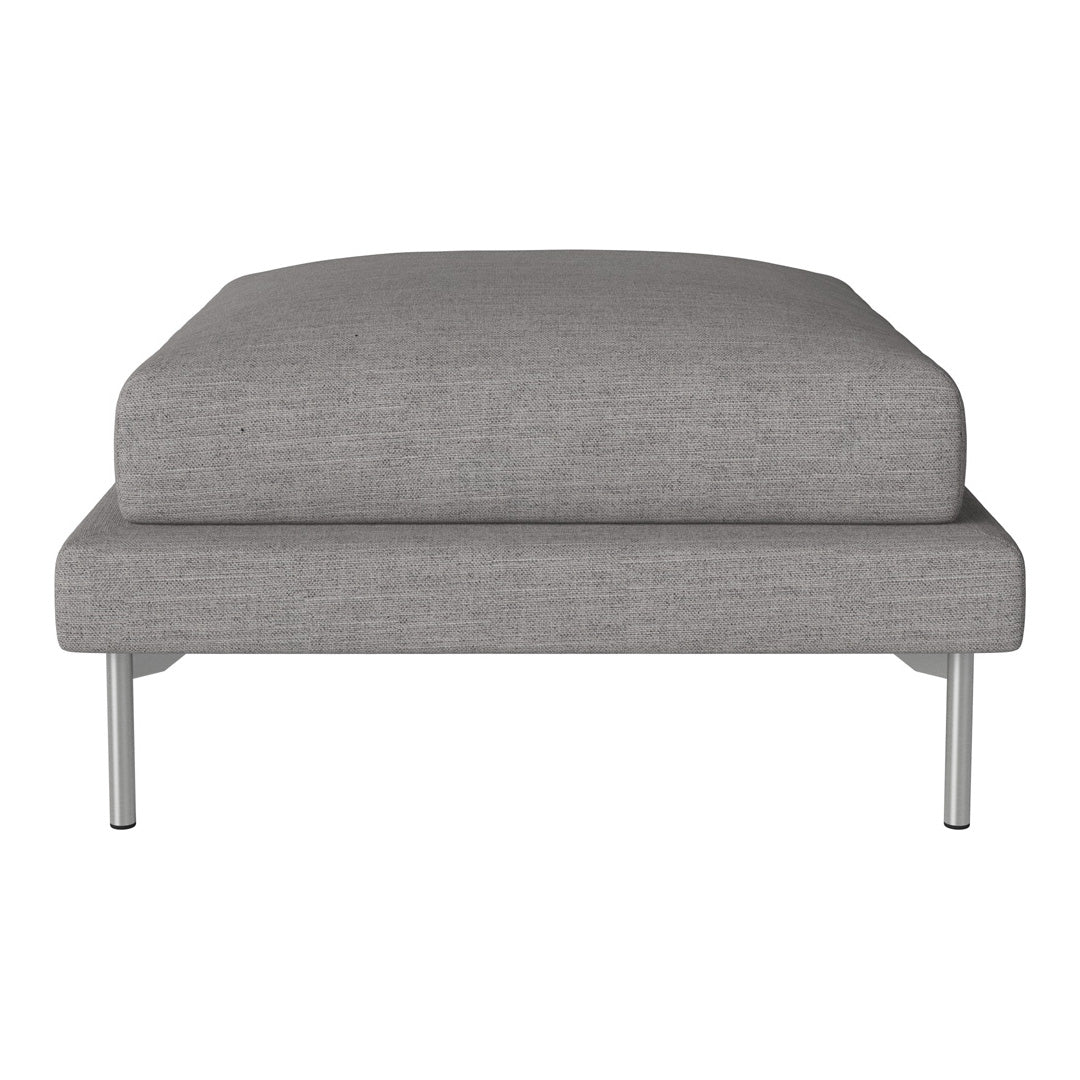 Gray upholstered ottoman with a sleek, modern design and minimalist silver legs. Perfect for contemporary interiors.