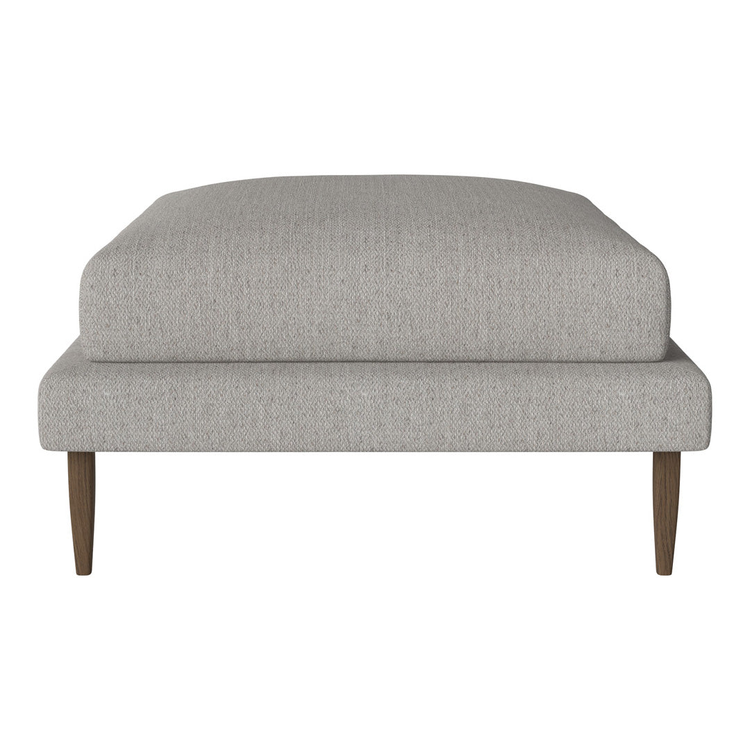 Light gray upholstered ottoman with a smooth texture and minimalist design, featuring wooden legs in a natural finish.