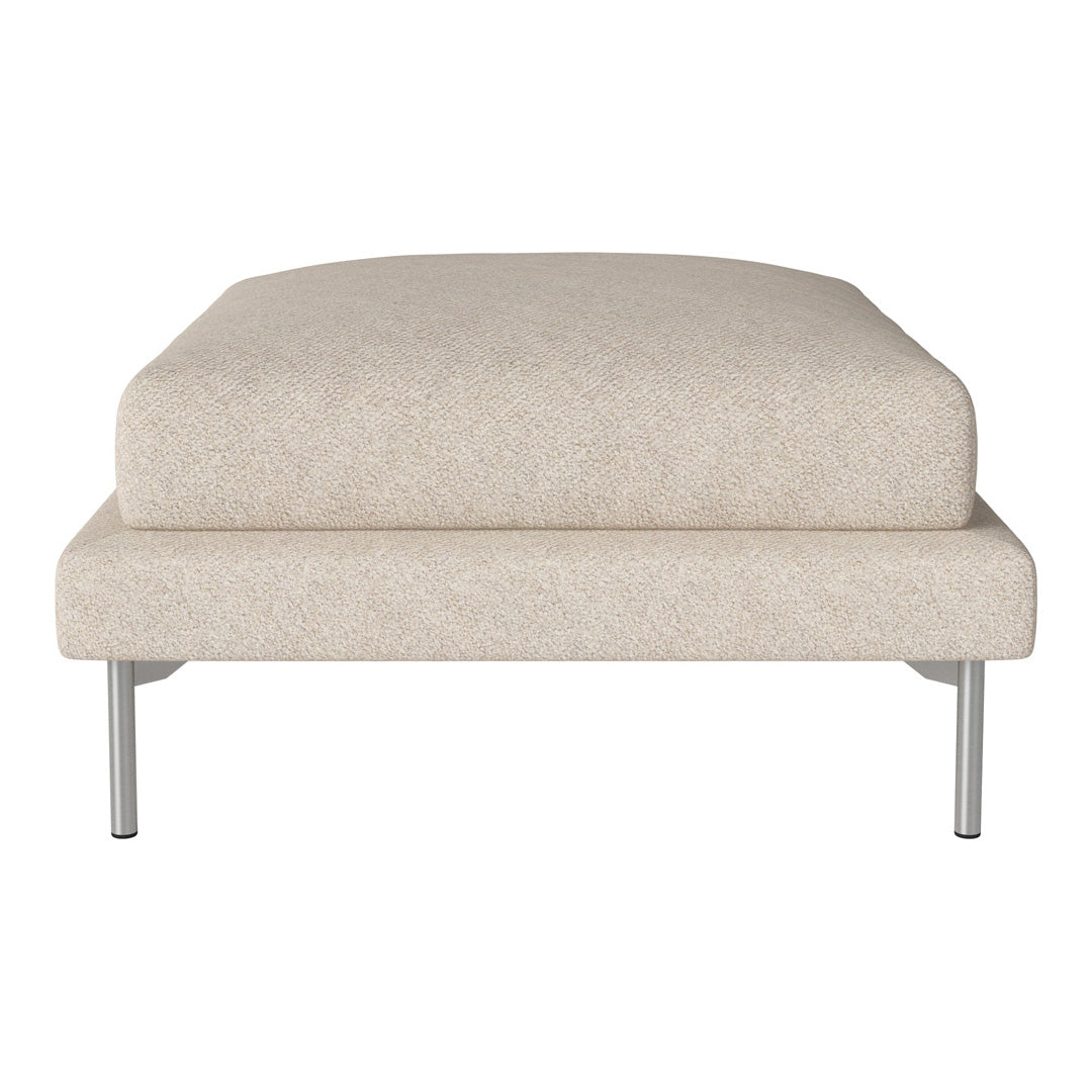 Beige upholstered ottoman with a simple, textured pattern and sleek silver legs. Perfect for modern decor.