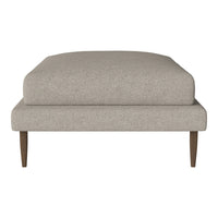 Beige upholstered ottoman with a smooth texture and wooden legs, perfect for modern or minimalist decor.
