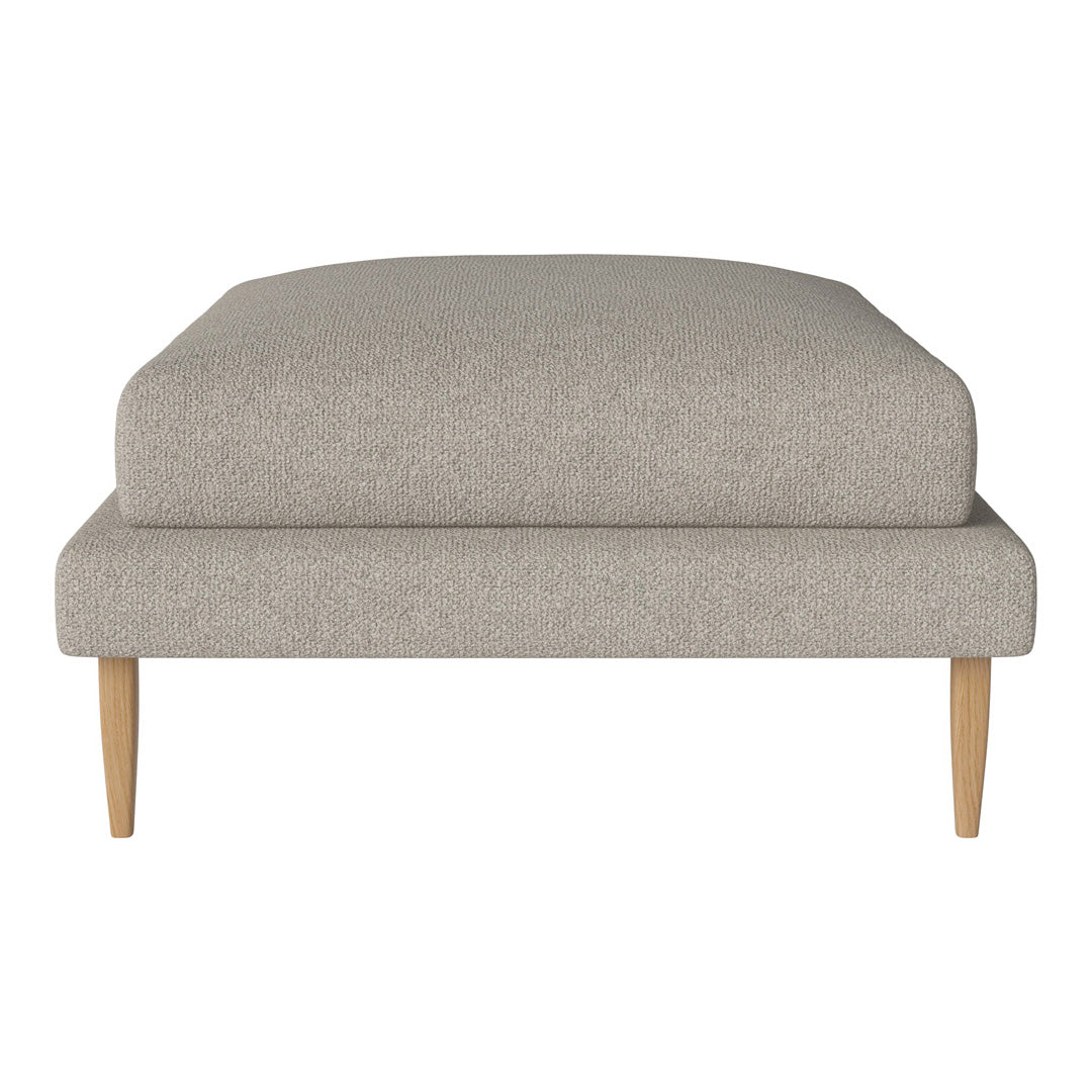 Light gray upholstered ottoman with a textured fabric and natural wood legs, featuring a minimalist design.