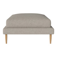 Light gray upholstered ottoman with a textured fabric and natural wood legs, featuring a minimalist design.