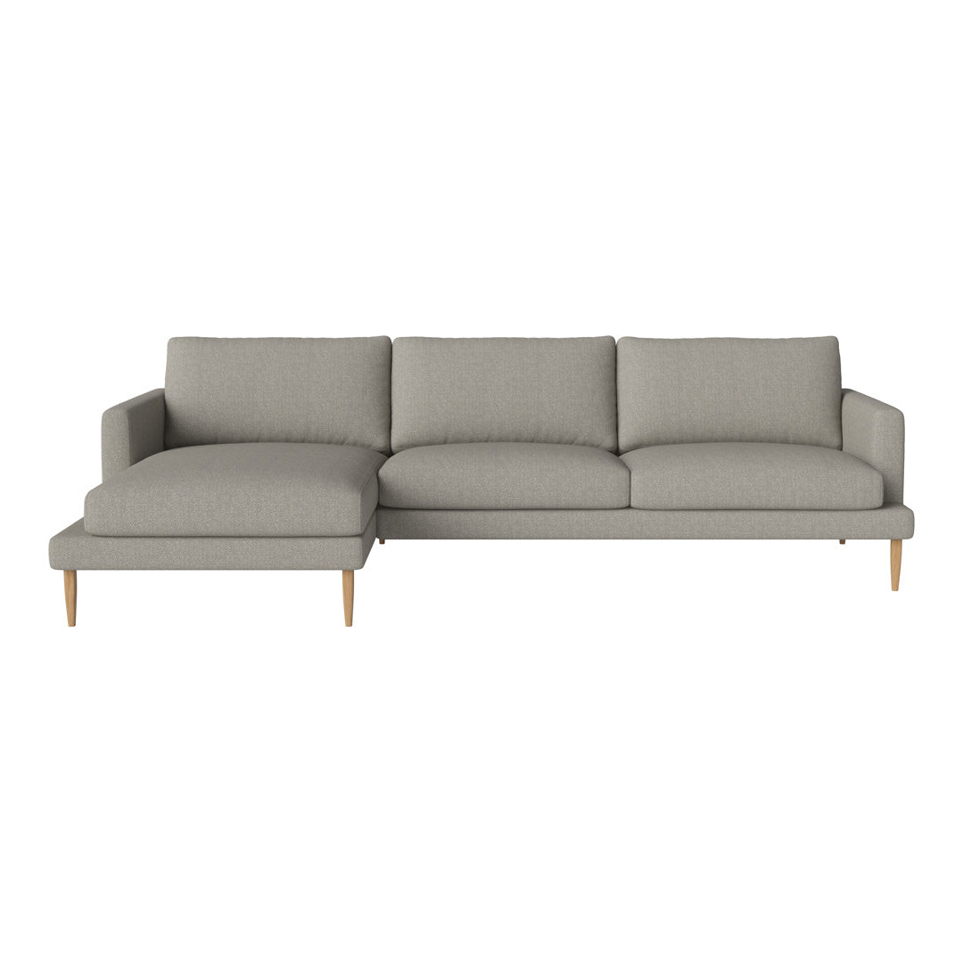 Light gray upholstered sectional sofa with smooth fabric and wooden legs, featuring a simple, modern design.