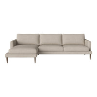 Beige sectional sofa with a simple, modern design and smooth fabric, featuring subtle texture and wooden legs.